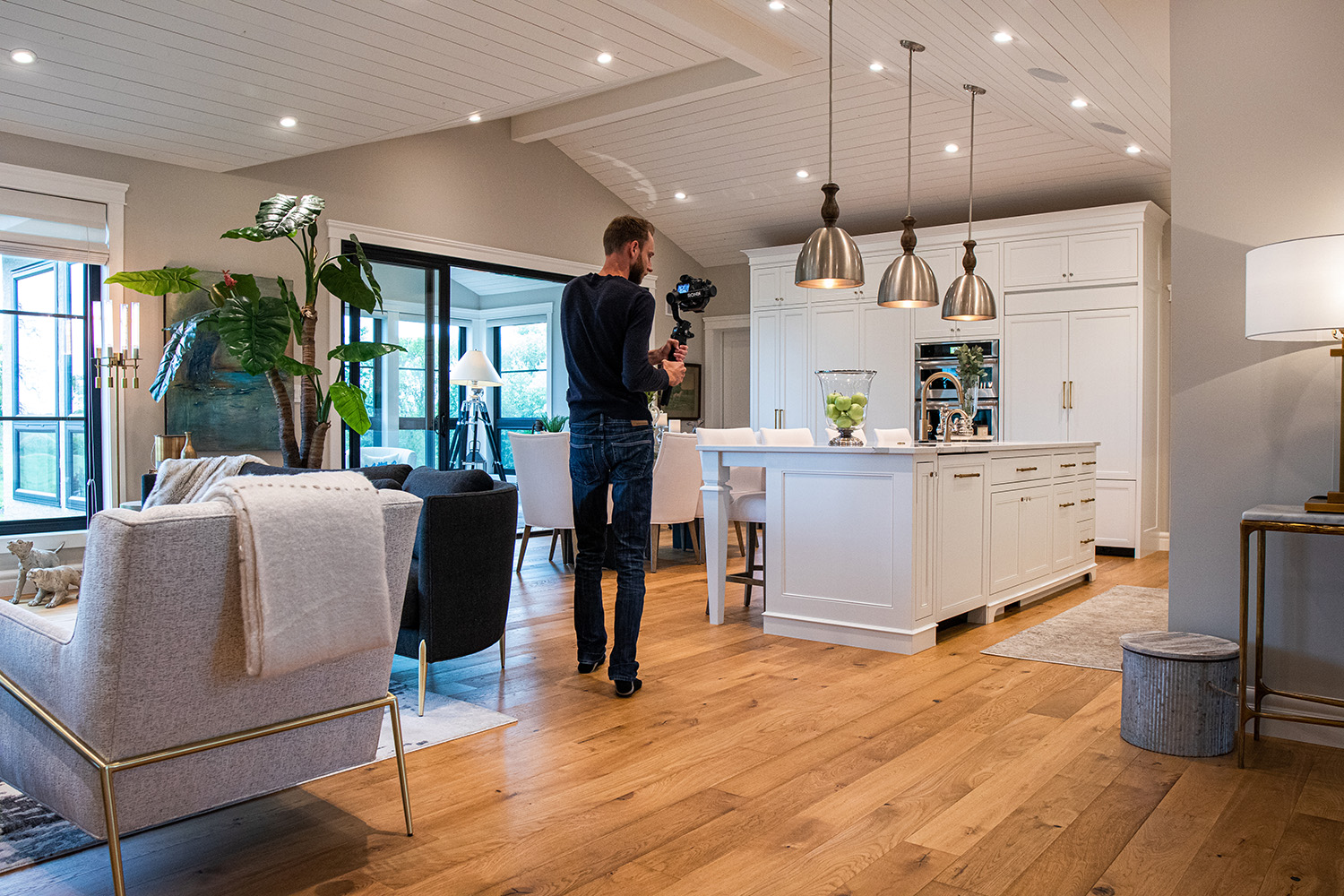 A photographer takes photo of home ready to sell on the market