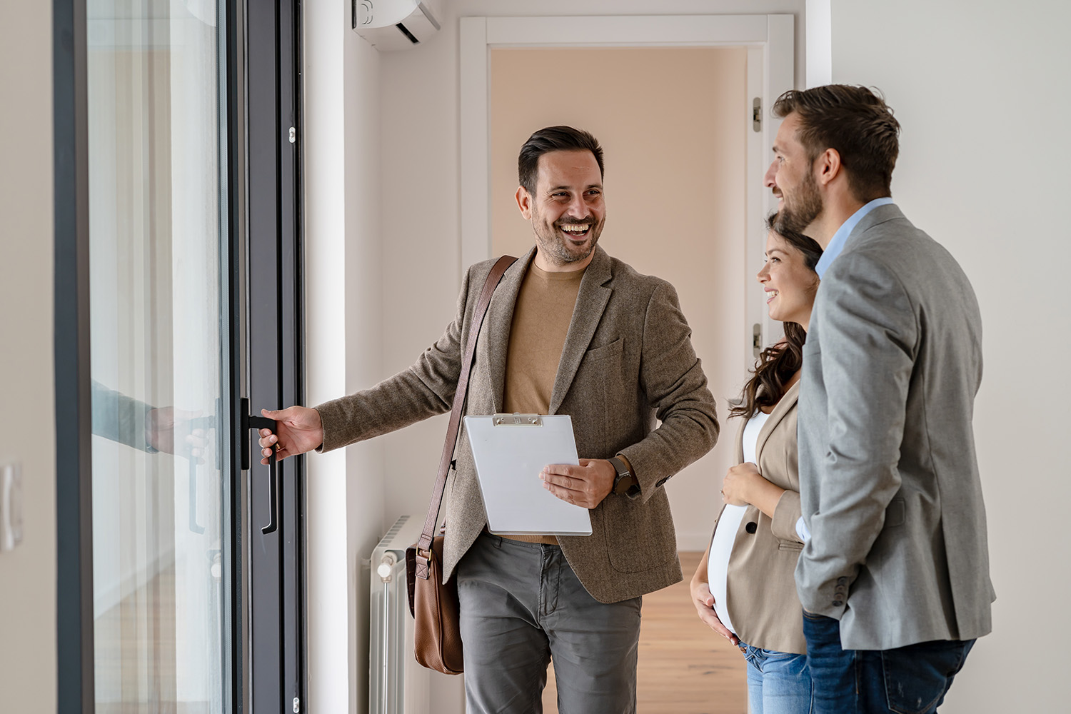 Real estate agent working with clients to negotiate best deal